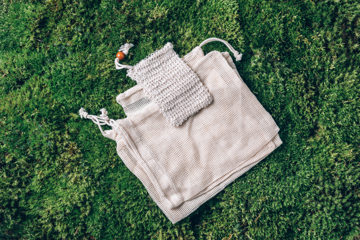 Reusable Textile Bags on Green Grass